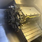 Turret inside the Haas SL-20 CNC Lathe with 10 tool stations by Northeast Precision Machinery